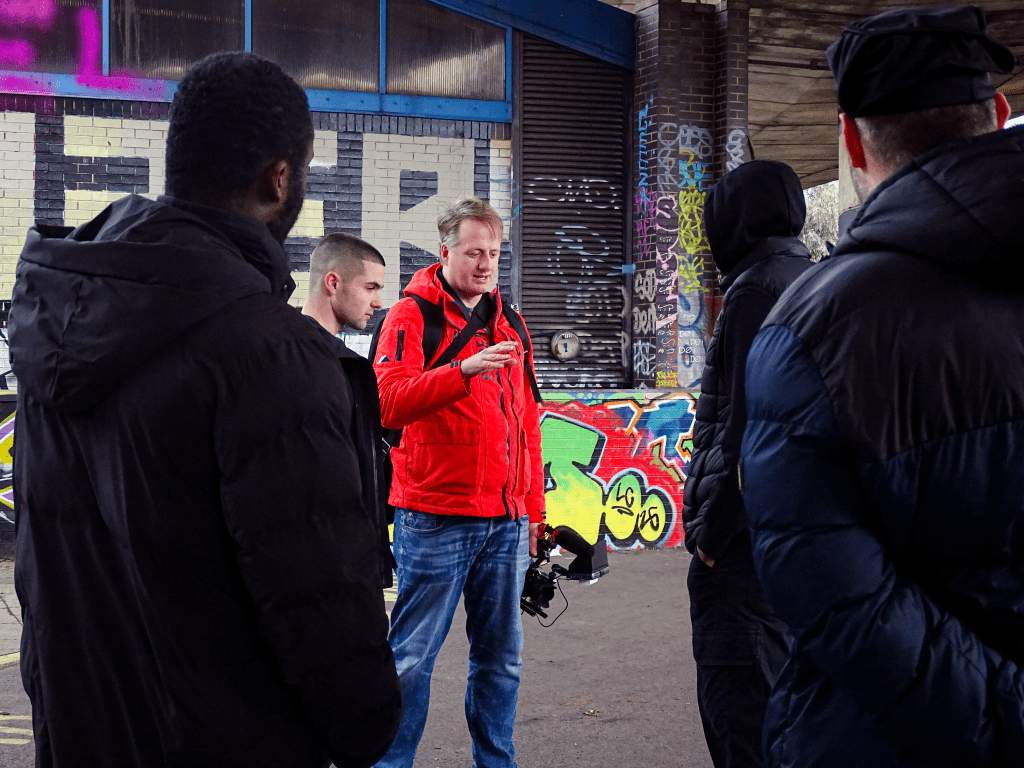 Director explaining a scene to actors.