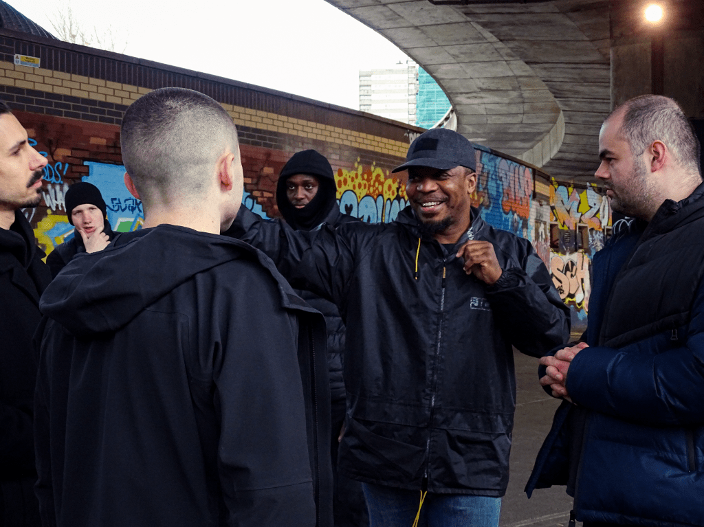 Stunt coordinator choreographing a fight scene.